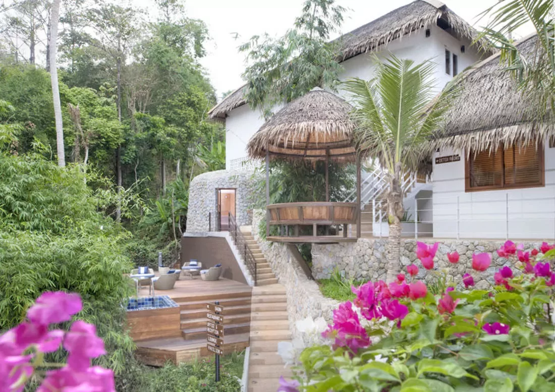 The Santosa buildings on the green hillside above Kata